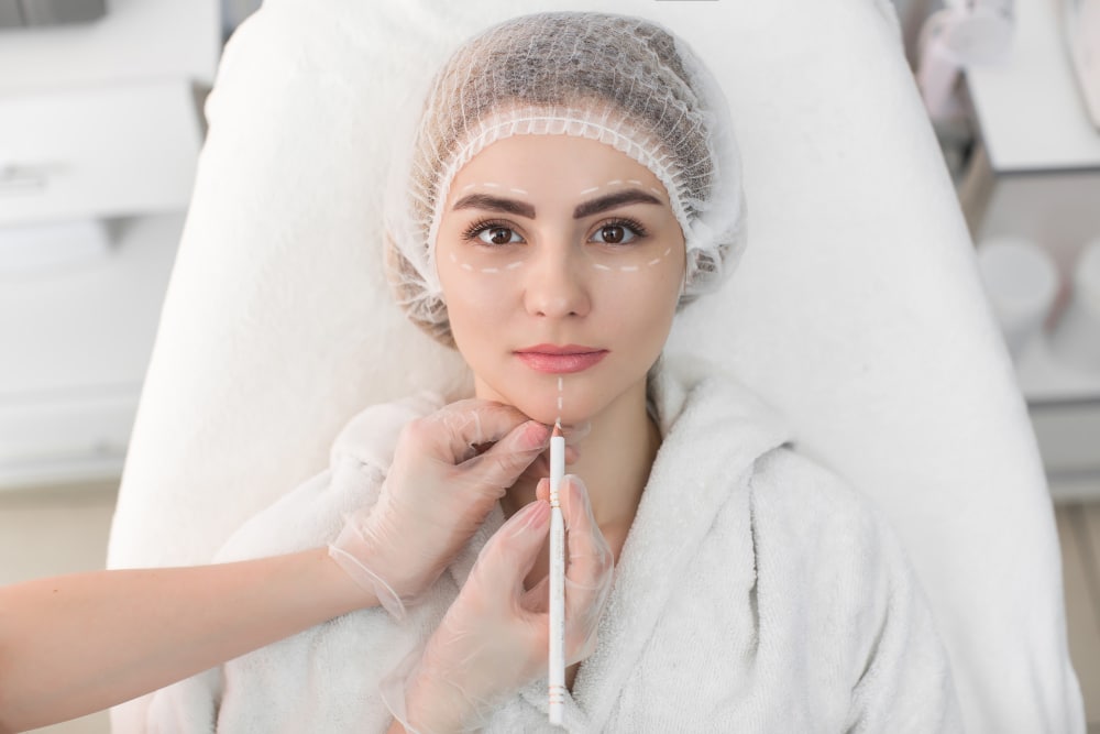 woman receiving cosmetic injection botox
